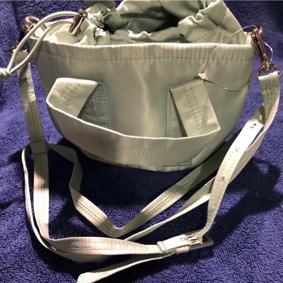 Pink  crossbody bucket handbag with adjustable removable straps mint. 4.5Wx5H. - Picture 3 of 3